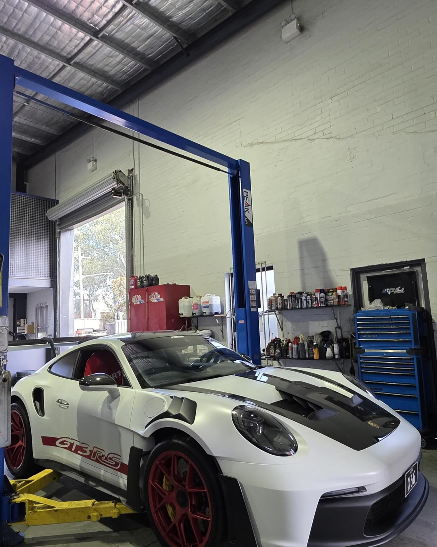 Porsche 911 GT3 RS on the hoist at Service Haus